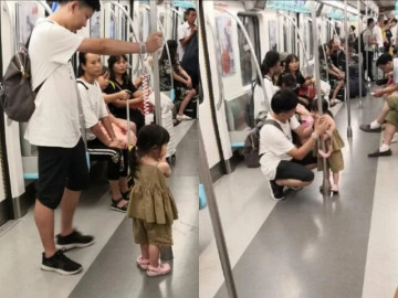 bo-dua-con-gai-di-tau-dien-nhung-chi-dung-ma-khong-ngoi-hanh-khach-chu-y-den-cai-tay-nguoi-dan-ong